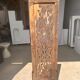 Rectangular Indonesian construction element with blue and yellow plant in carved wood