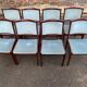 8 Scandinavian chairs in solid teak and blue velvet from the 1960s