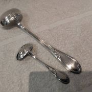 2 Silver-plated soup and sauce ladles with rocaille ribbon decoration