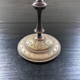 Chiseled brass candle holder