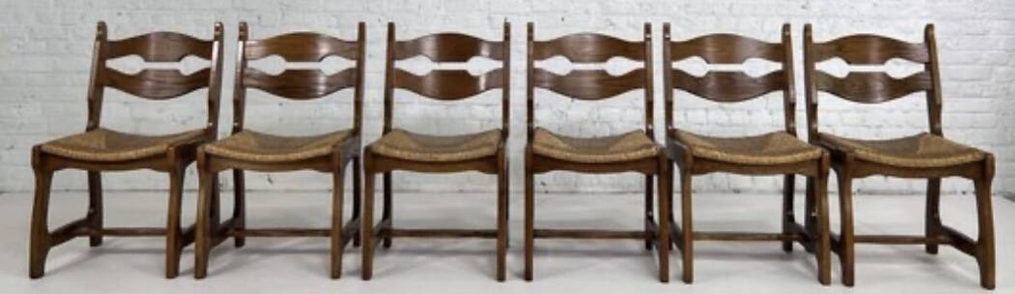 Guillerme and Chambron set of six light oak chairs