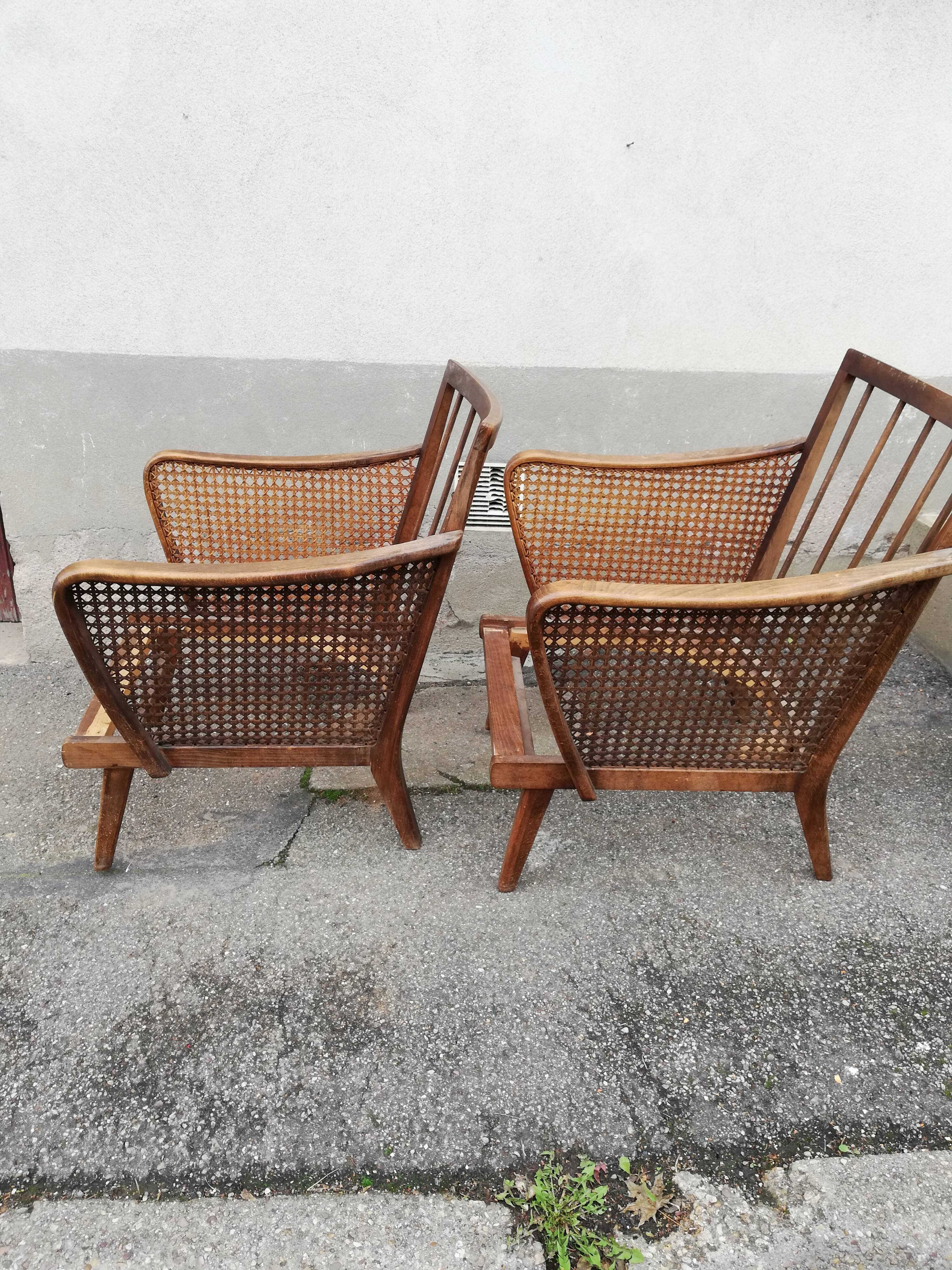 Paire de fauteuils vintage pieds compas et cannage