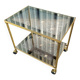 Vintage golden metal rolling dessert trolley