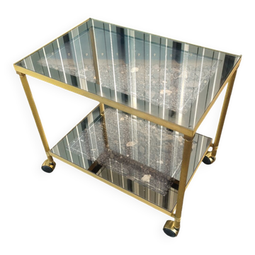 Vintage golden metal rolling dessert trolley