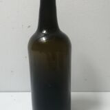 Old bottle made of blown glass