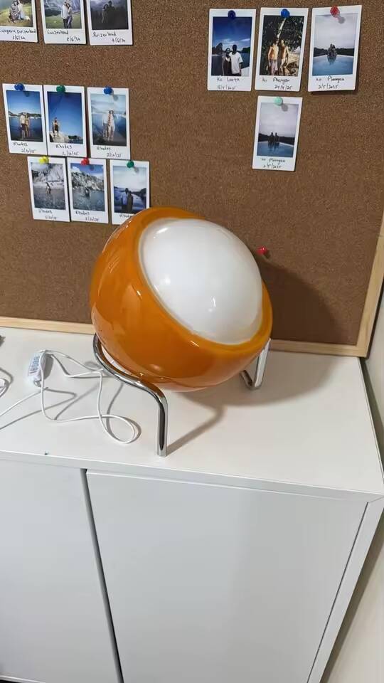 Orange table lamp in Bauhaus style