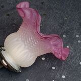 Metal wall lamp with frosted glass shade in the shape of a pink corolla