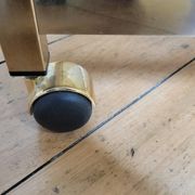 Gold metal and smoked glass serving trolley