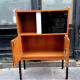 Bookcase, coloured windows, metal base, 1960
