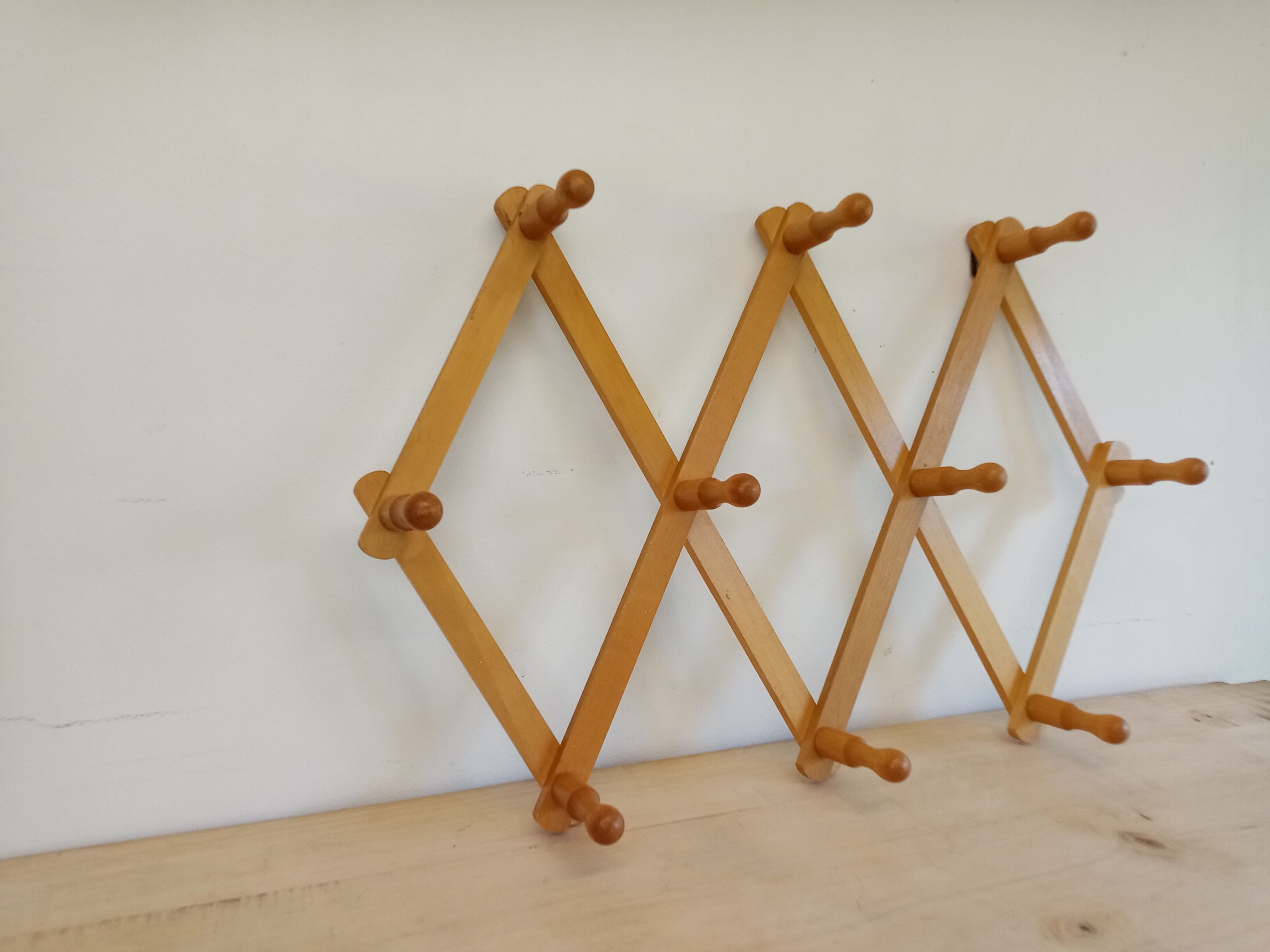 Wooden accordion coat rack