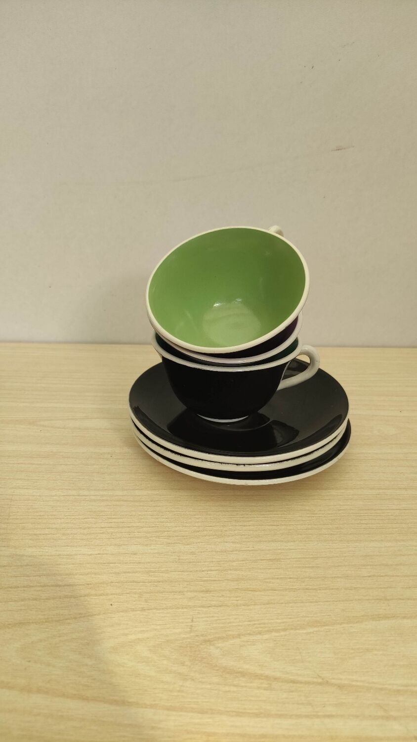Coffee cups with saucers