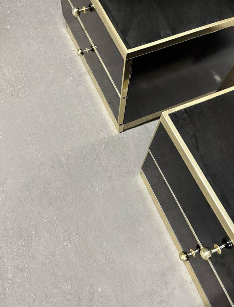 Pair of black lacquered and brass bedside tables, Roche Bobois 1970