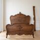 Double bed in carved wood, Louis XV style.