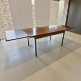 Vintage wooden dining table with chrome frame.