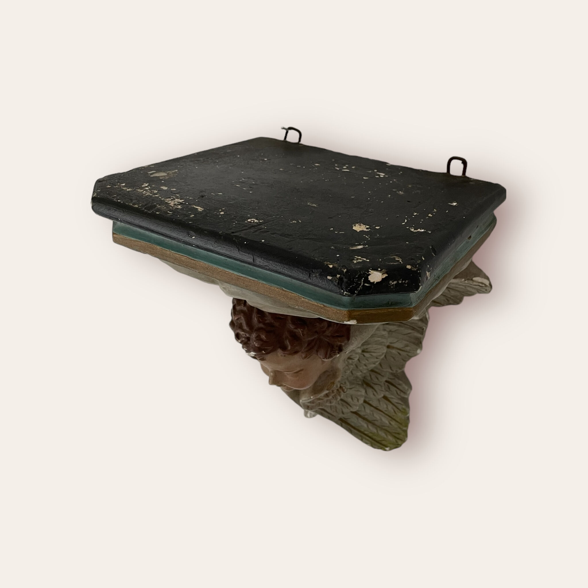 Nineteenth century plaster wall console, cherub decoration