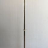 Floor lamp in gilded brass and plexiglass