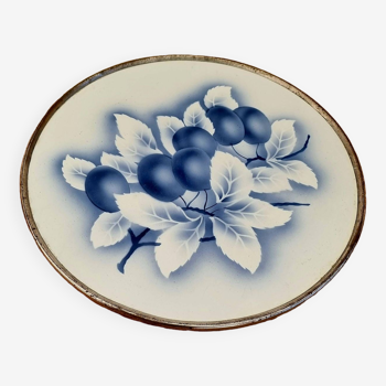 Large ceramic trivet decorated with plums