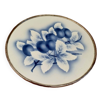 Large ceramic trivet decorated with plums