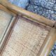 Vintage rattan wall shelf with mirror