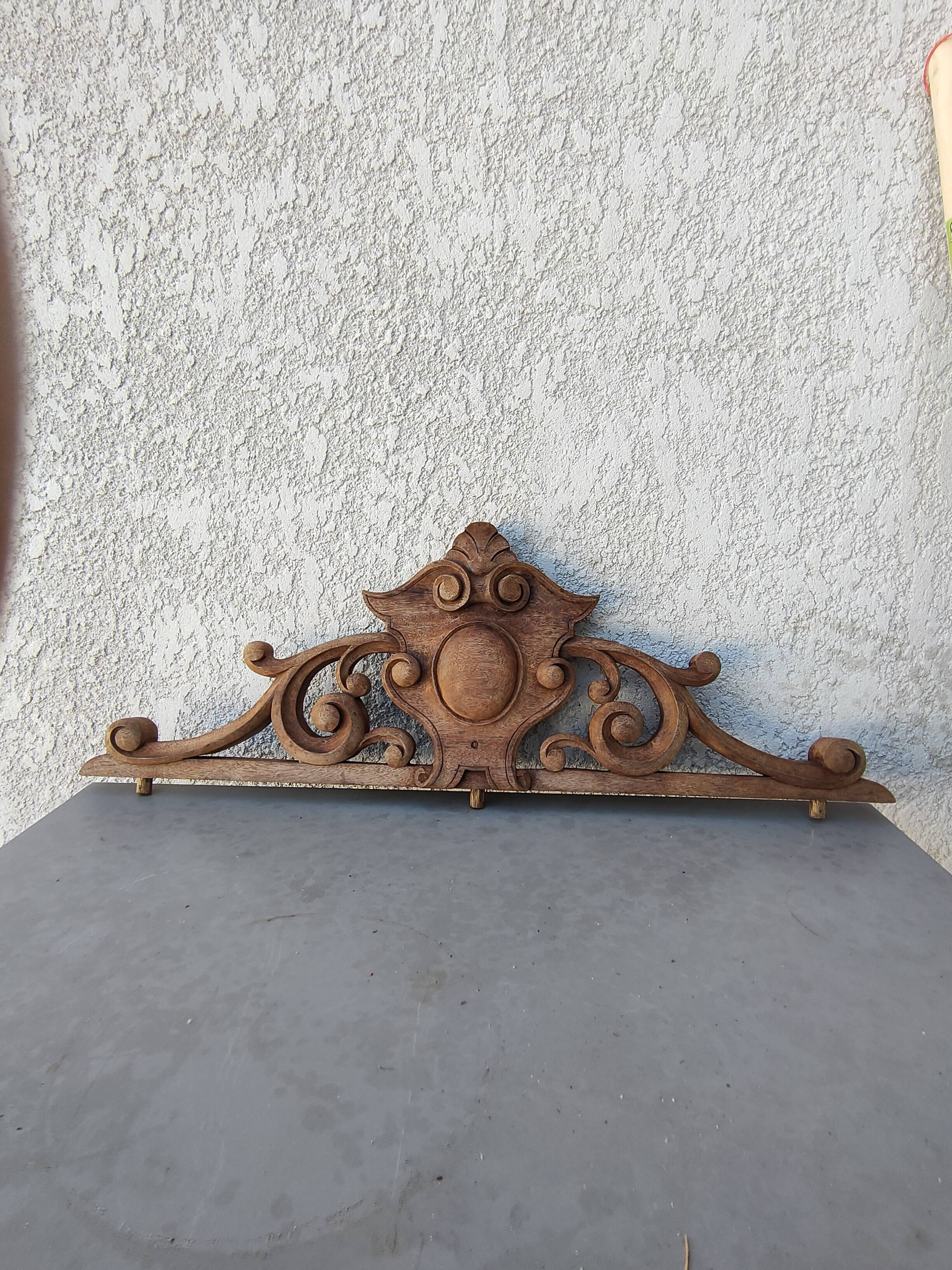 old wooden pediment
