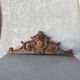 old wooden pediment