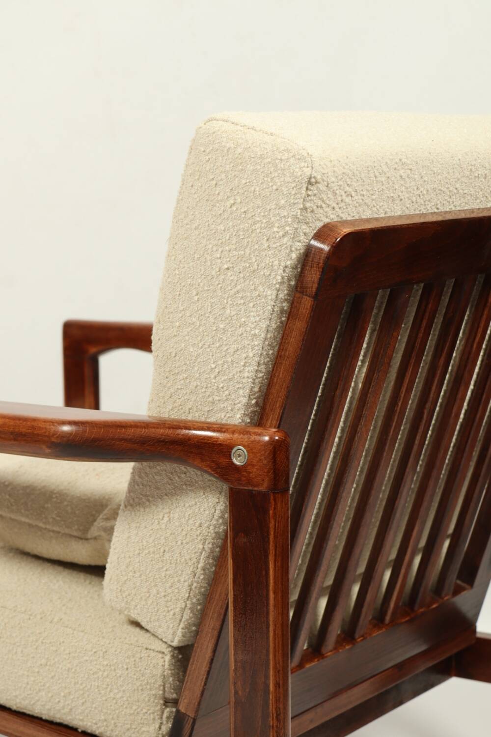 Vintage dark wood beige bouclé armchair by Z.Baczyk 1965