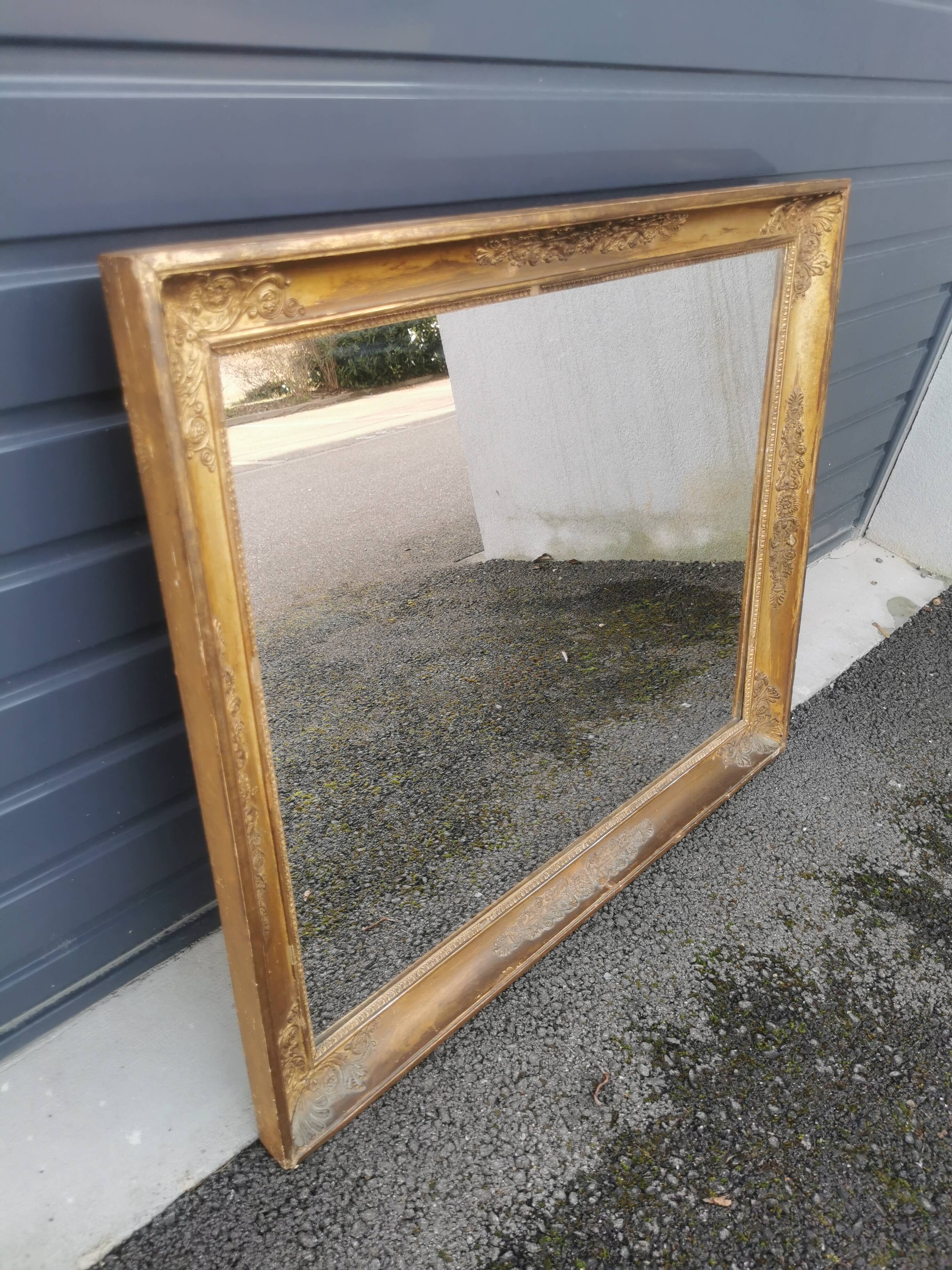 Gilded carved wooden mirror