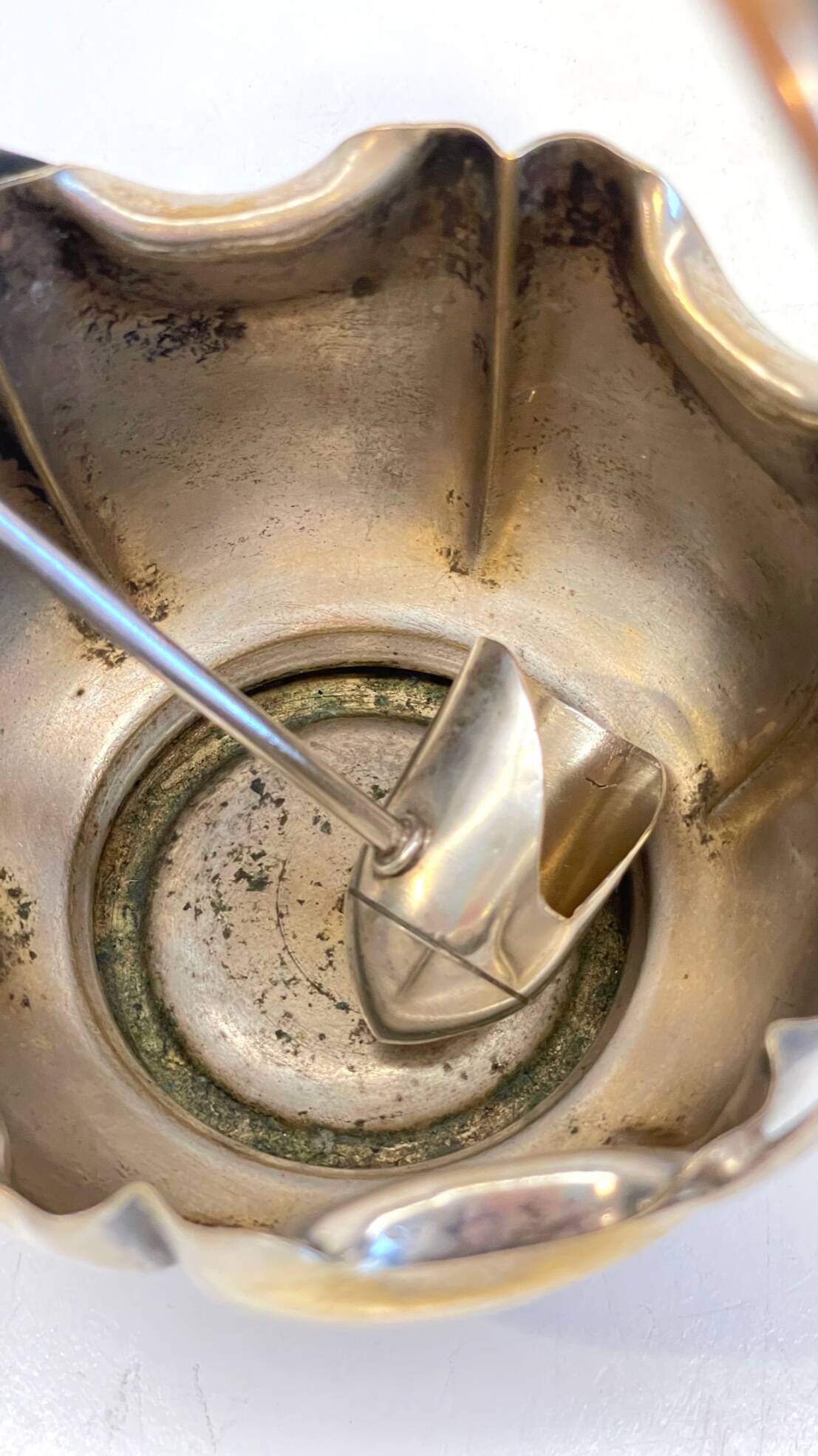 silver metal sugar bowl with gold patina