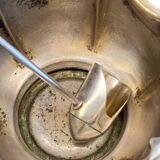 silver metal sugar bowl with gold patina