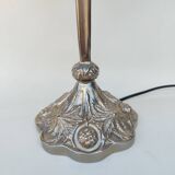 Art Nouveau style lamp, in bronze and frosted glass.