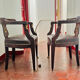 Pair of Empire armchairs in bronze and mahogany.