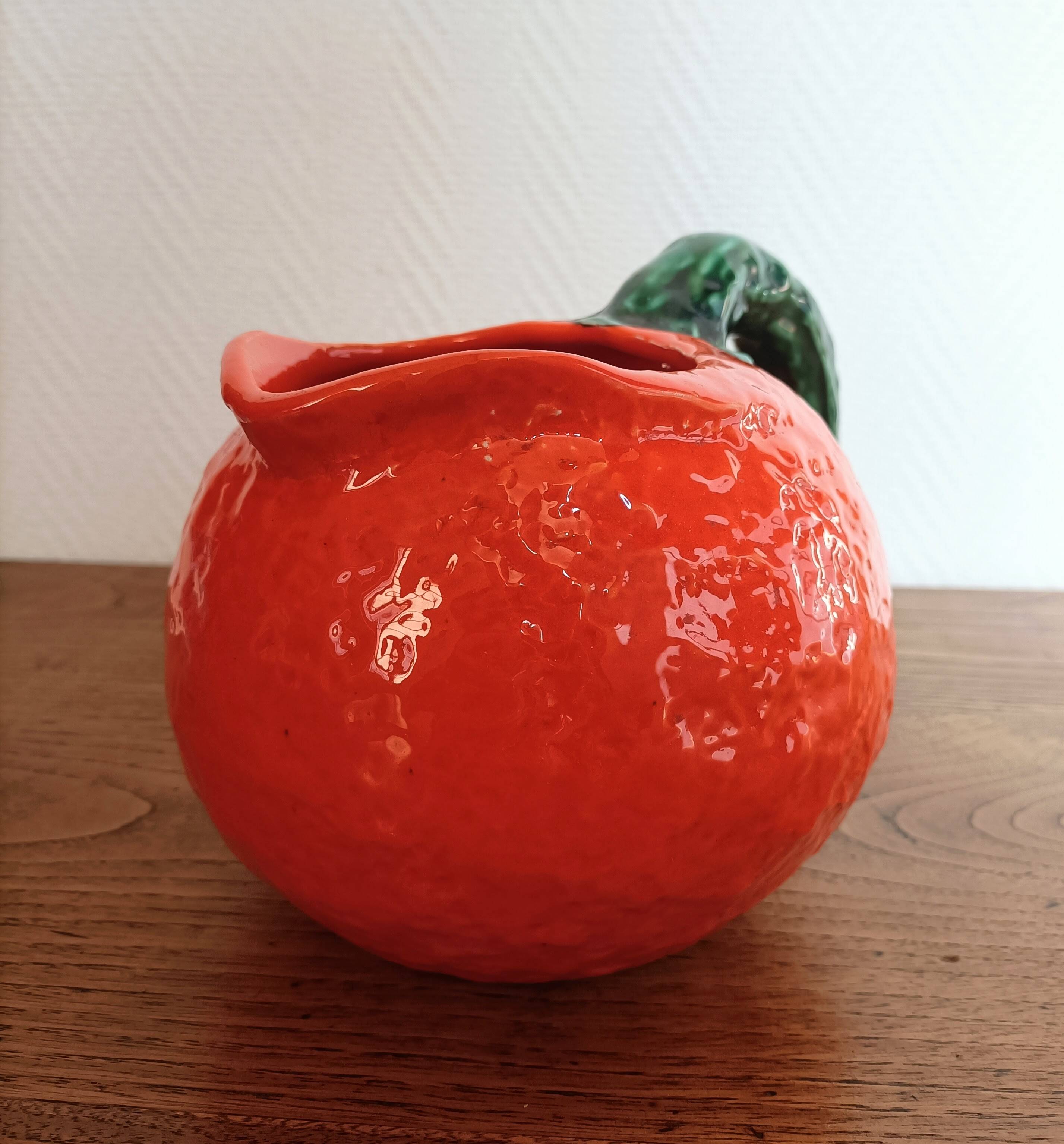Orange pitcher in Corsican slip
