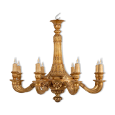 Dumez, Lustre de style Louis XVI en bois sculpté et doré. Années 1950.