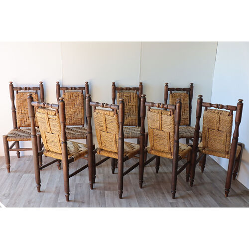 Série de 8 chaises vintage en bois et corde tressée 1960
