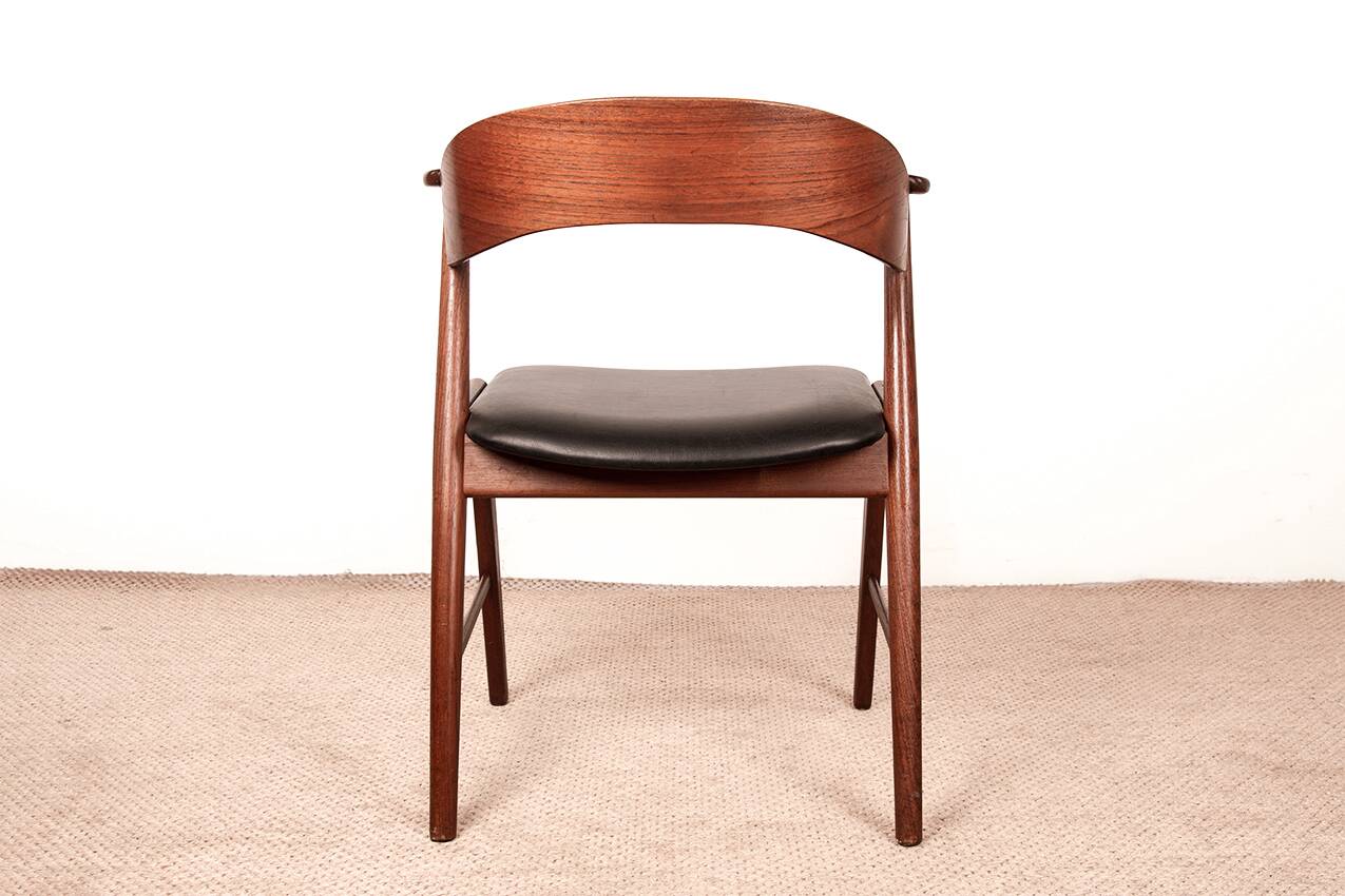 Danish armchair in teak and Skai, by Henning Kjaernulf for Korup Stolefabr.