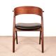 Danish armchair in teak and Skai, by Henning Kjaernulf for Korup Stolefabr.
