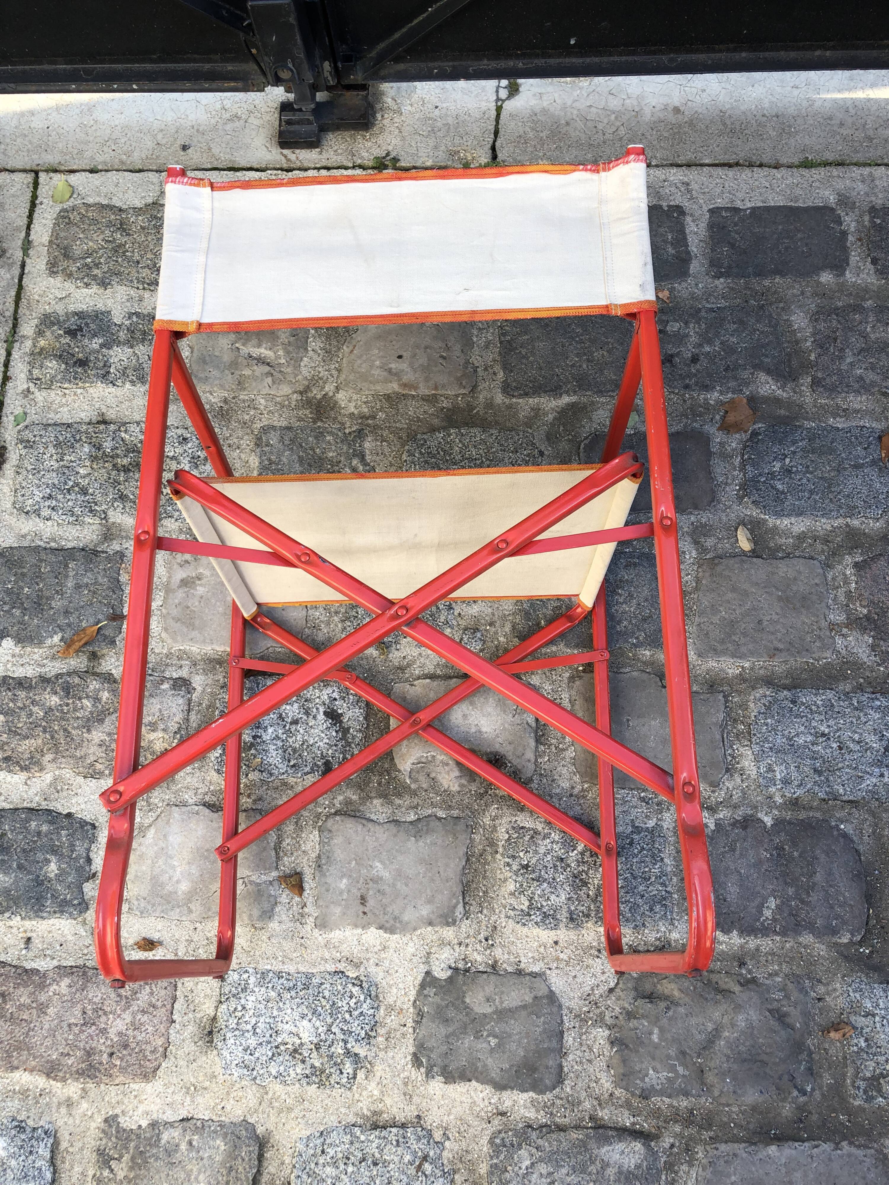 Folding metal armchair