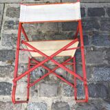 Folding metal armchair