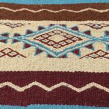 Multicolored hand-woven Berber rugs in natural wool