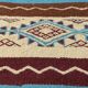 Multicolored hand-woven Berber rugs in natural wool