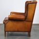 Beautiful and Comfortable Sheepskin Wingback Armchair with a Wonderful Patina