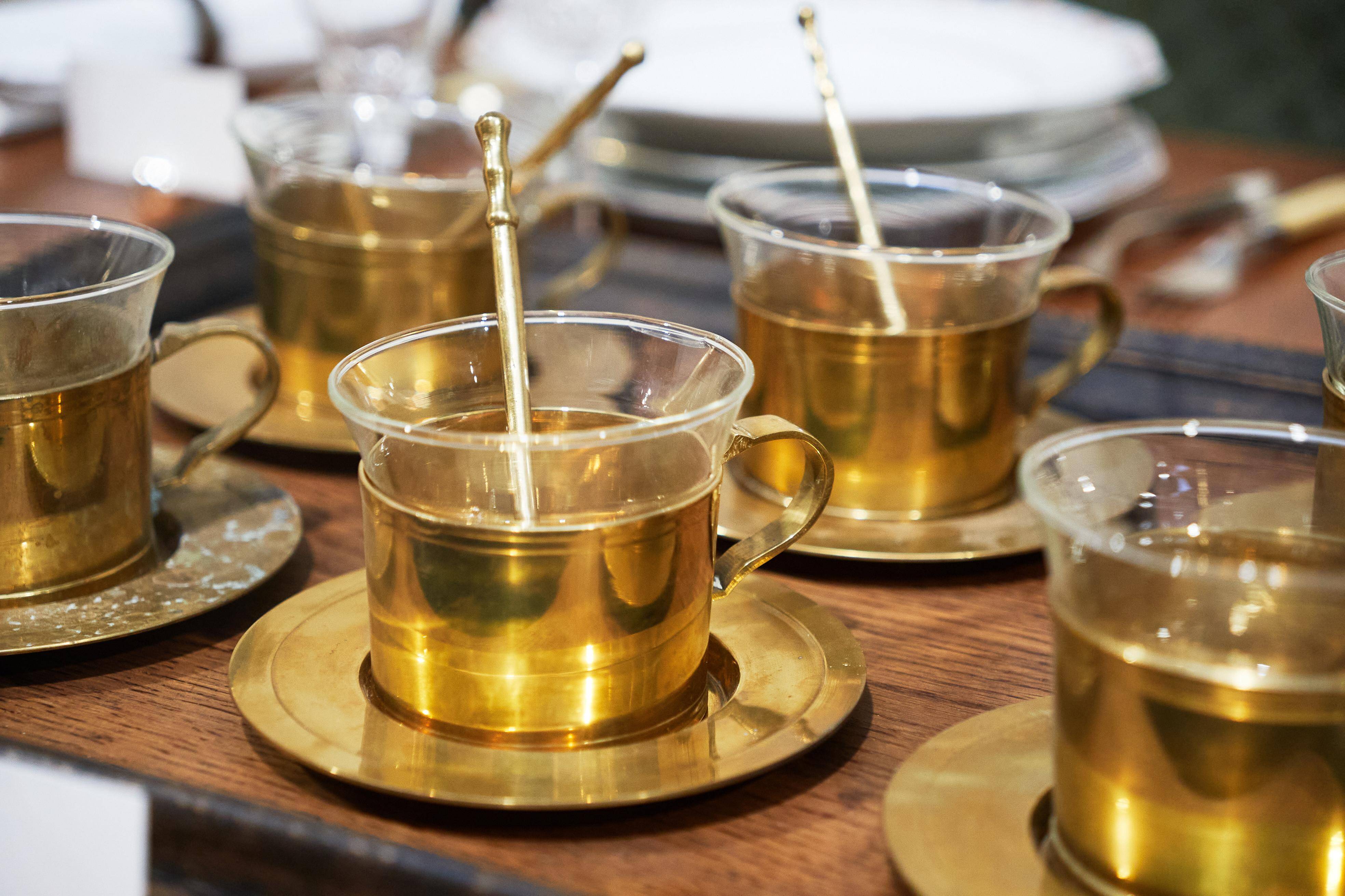 Mid-century tea service in patinated brass and glass