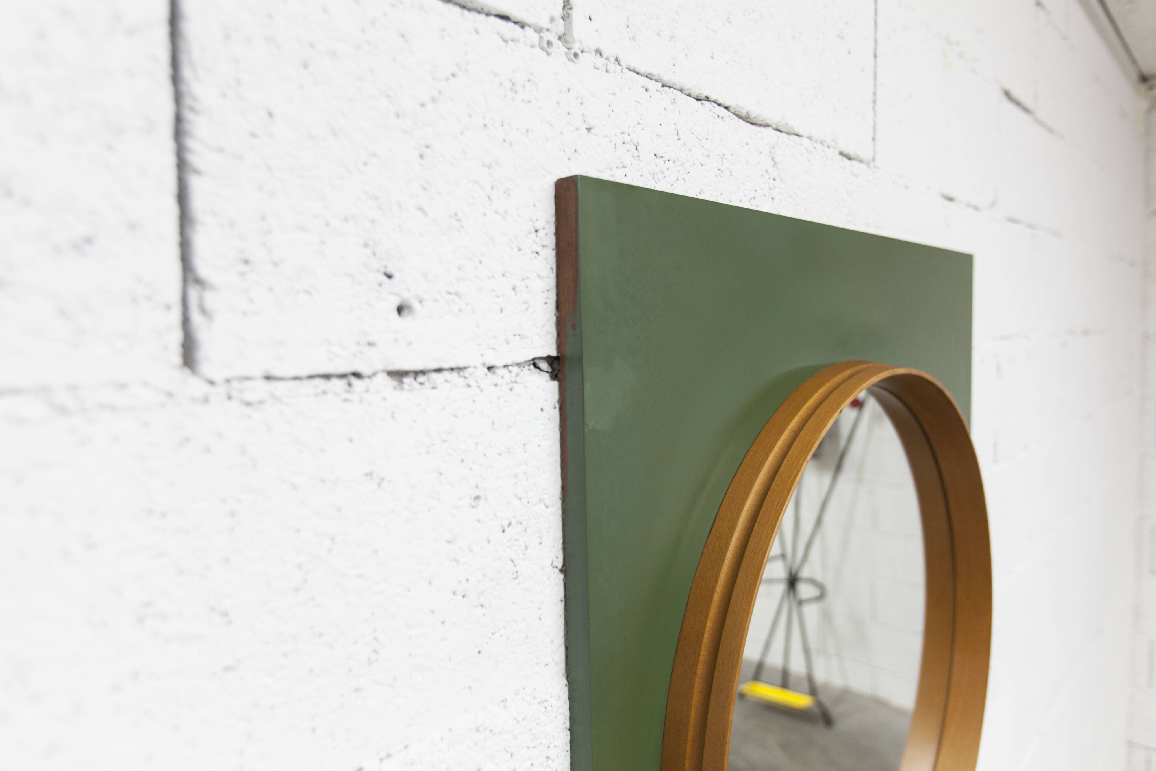 Unusual round wall mirror 60 cm teak edge on green rectangular board 1960.