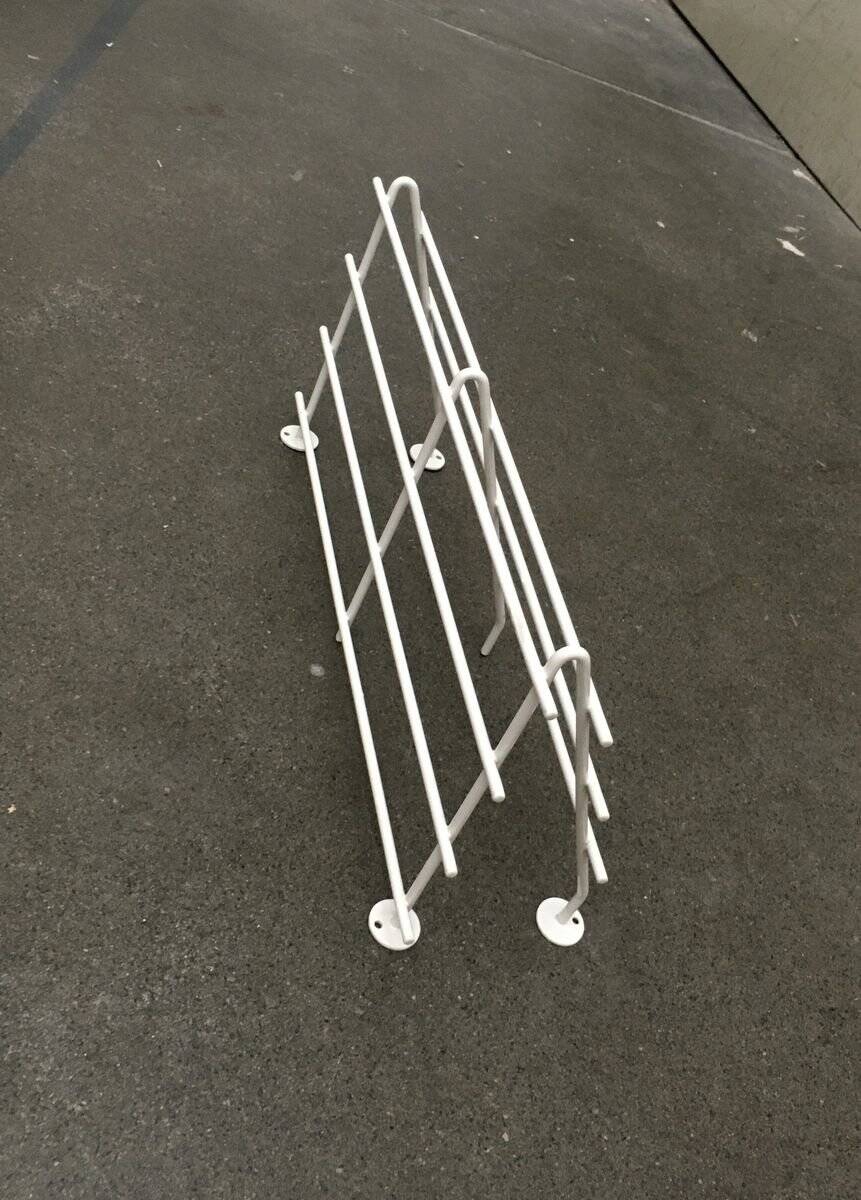 Mid-century modern minimalist metal coat rack from the 1960s.