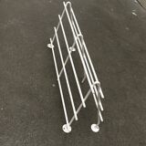 Mid-century modern minimalist metal coat rack from the 1960s.
