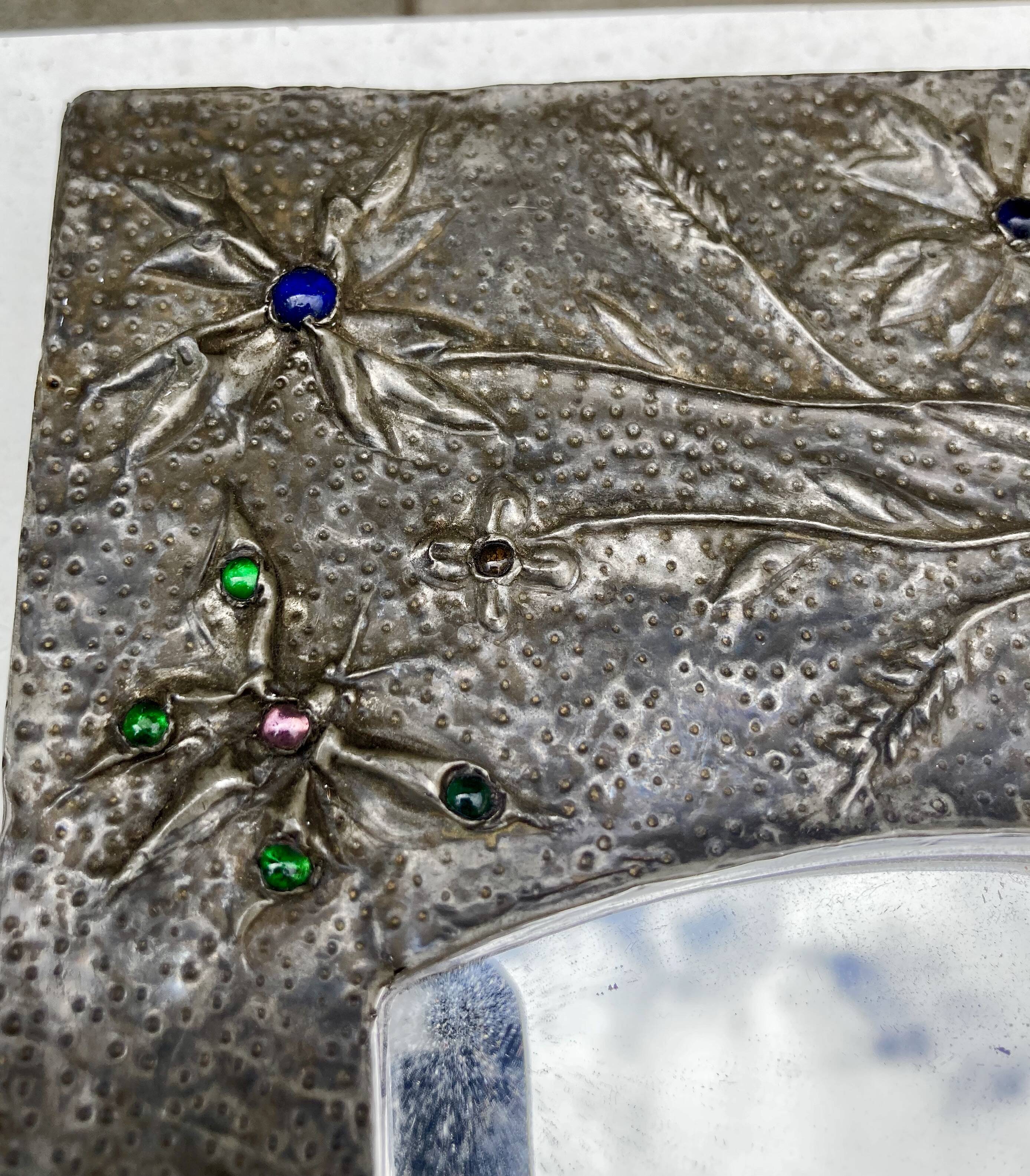 Mirror with embossed metal frame by alfred daguet, 1900s art nouveau period