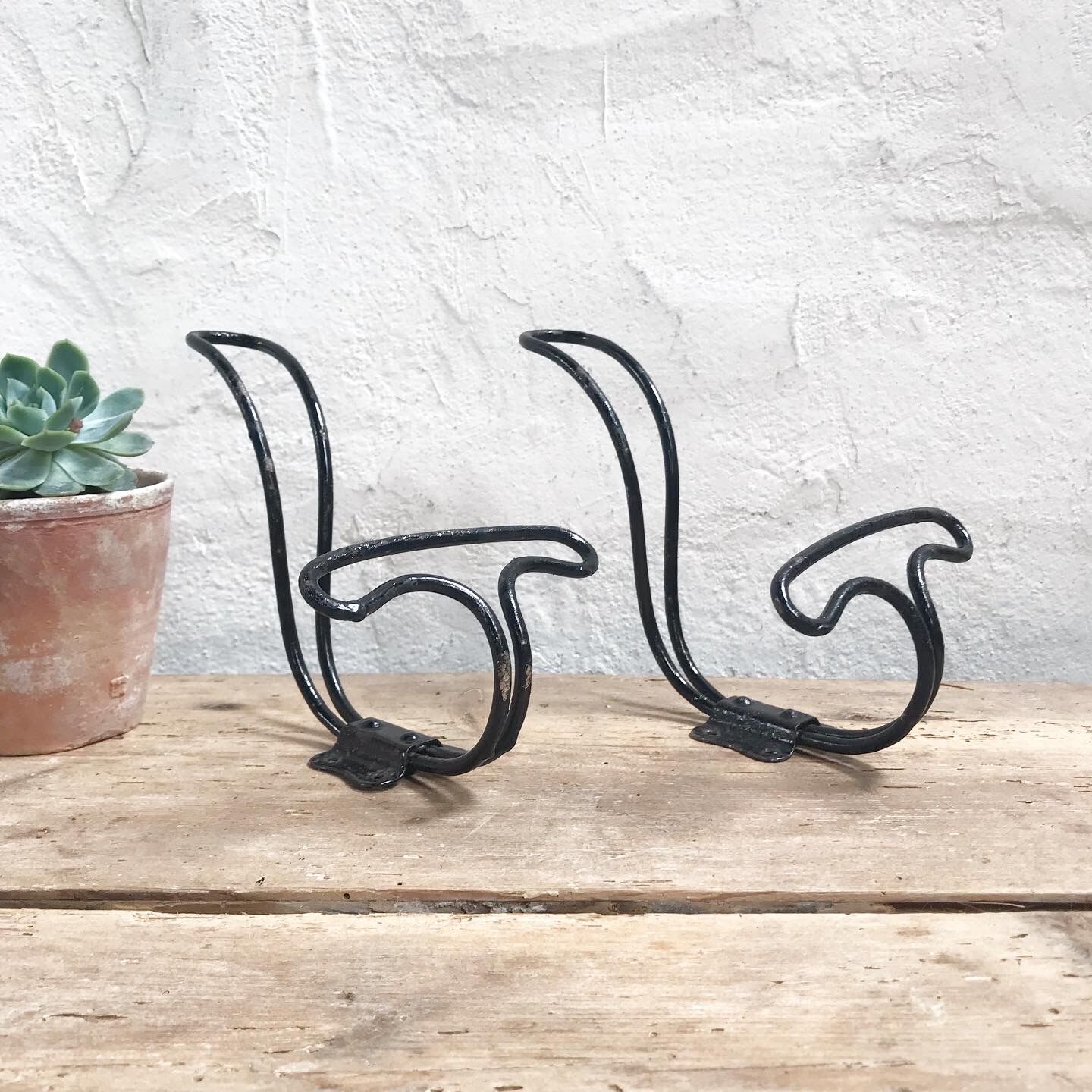 Pair of vintage metal hooks