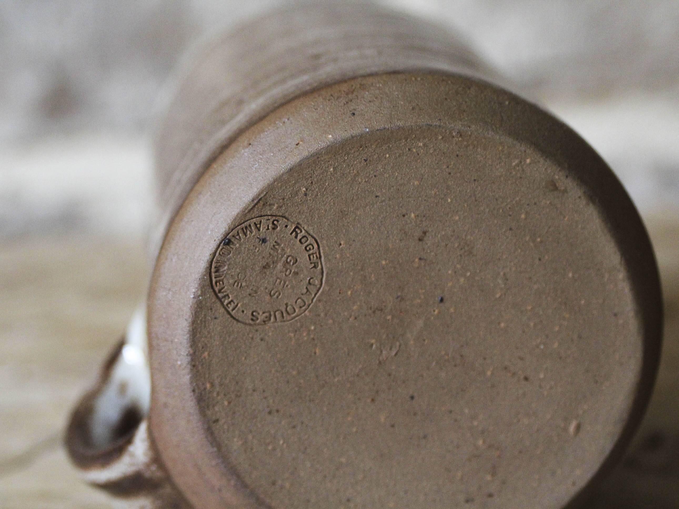 Pair of Roger Jacques Puisaye enameled stoneware cups