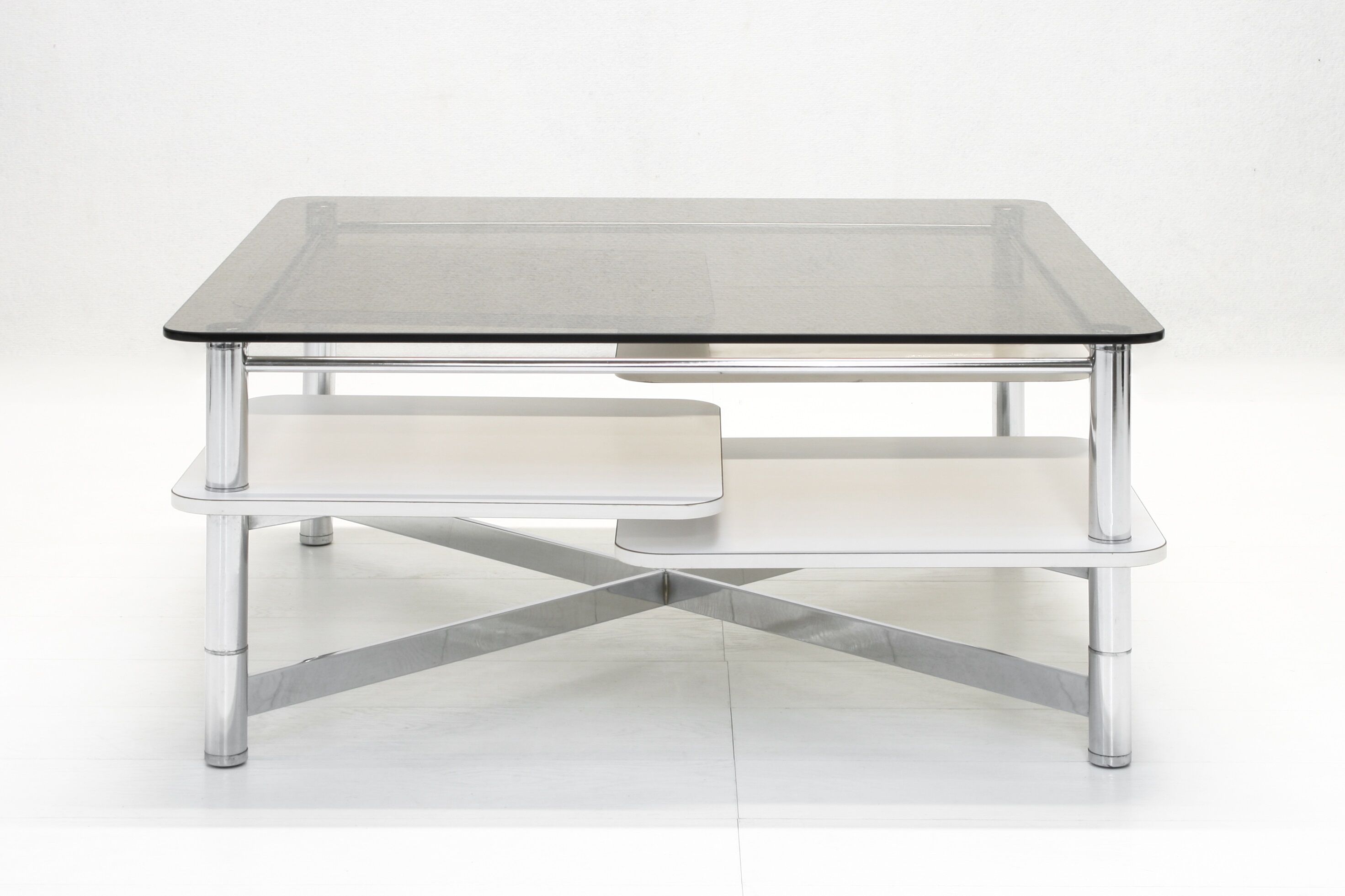 Vintage 1970s smoked glass swivel platform coffee table