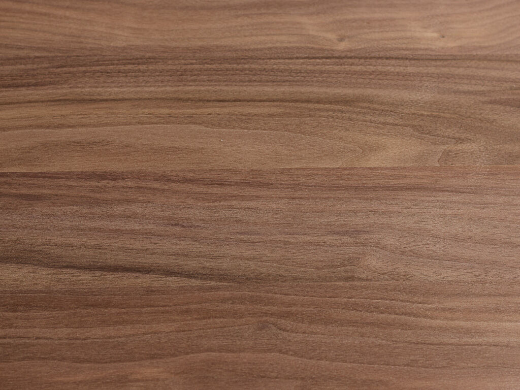 Solid walnut dining table on brass center base